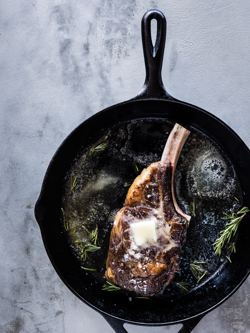 food stylist in San Fancisco - Seared Ribeye steak wtih butter for Home Cooked Cookbook photographed by Erin Kunkel Photographer