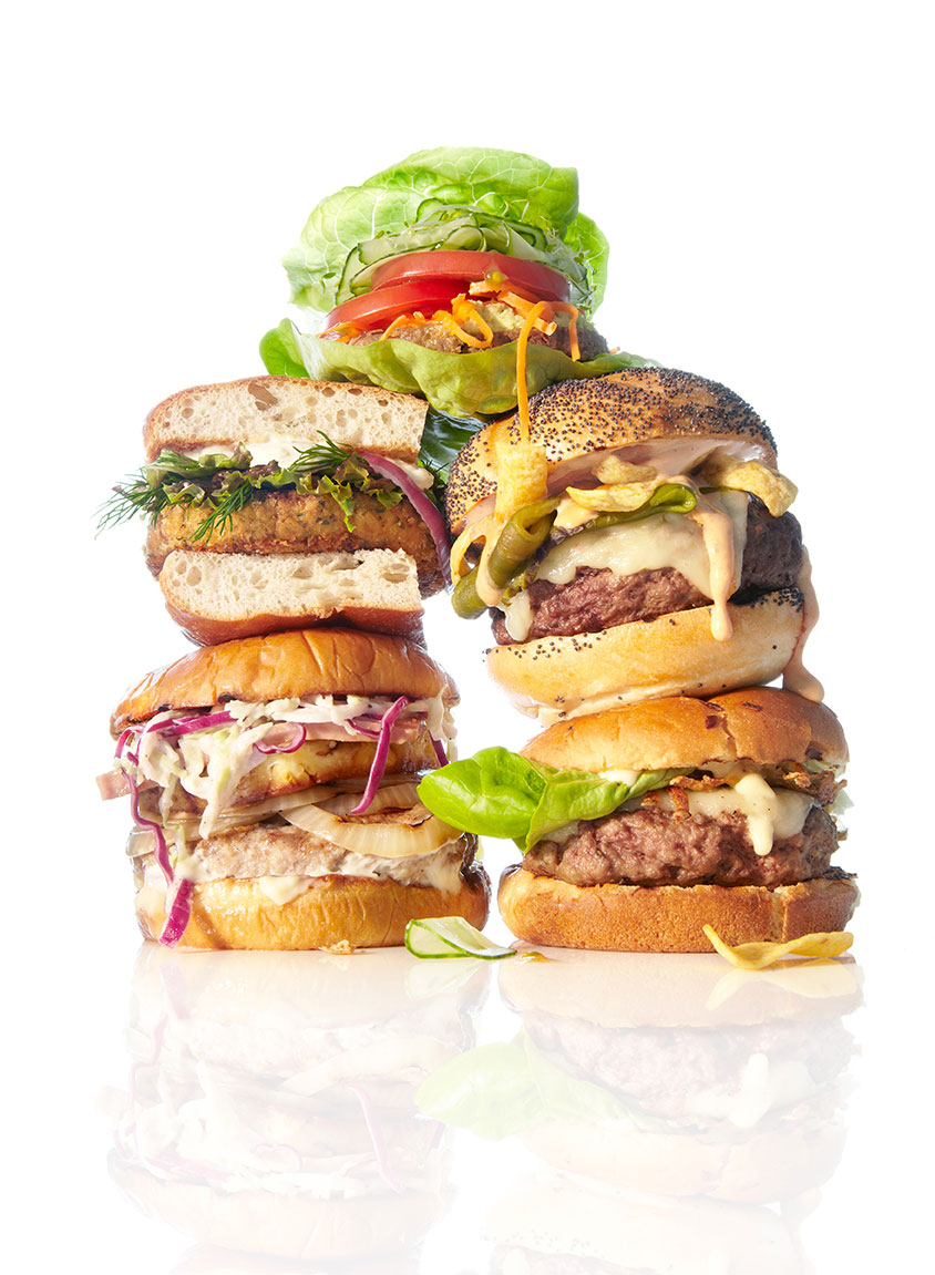 food stylist in San Francisco - Burger wall: Fish burger, chicken burger, hamburger, and veggie burger, photographed by Annabelle Breakey photographer